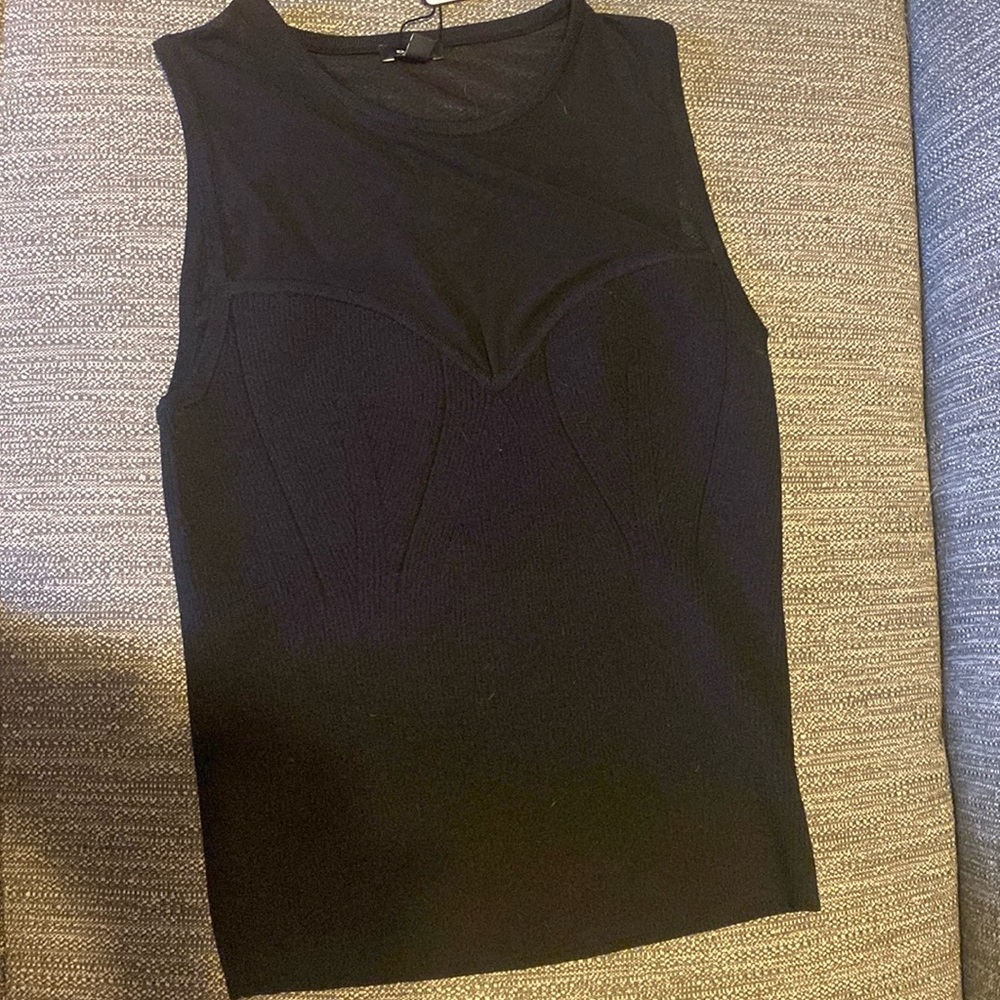 Brand new black Express top with mesh detailing. Small.